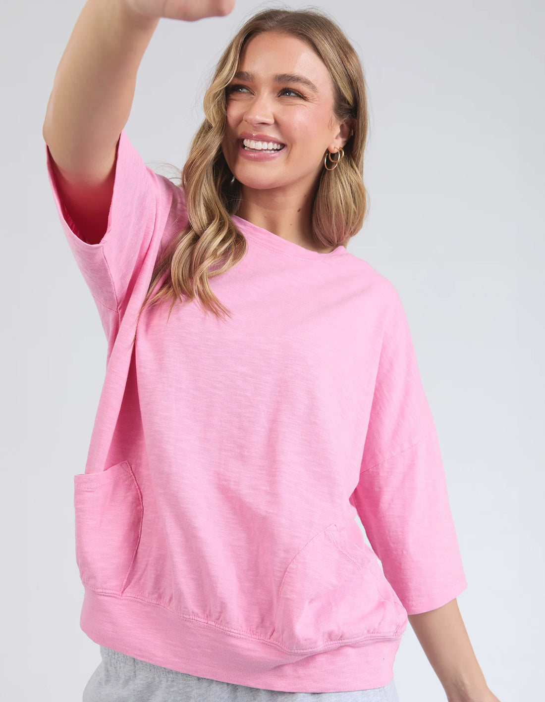 woman wearing elm lifestyle mazie sweat in strawberry pink