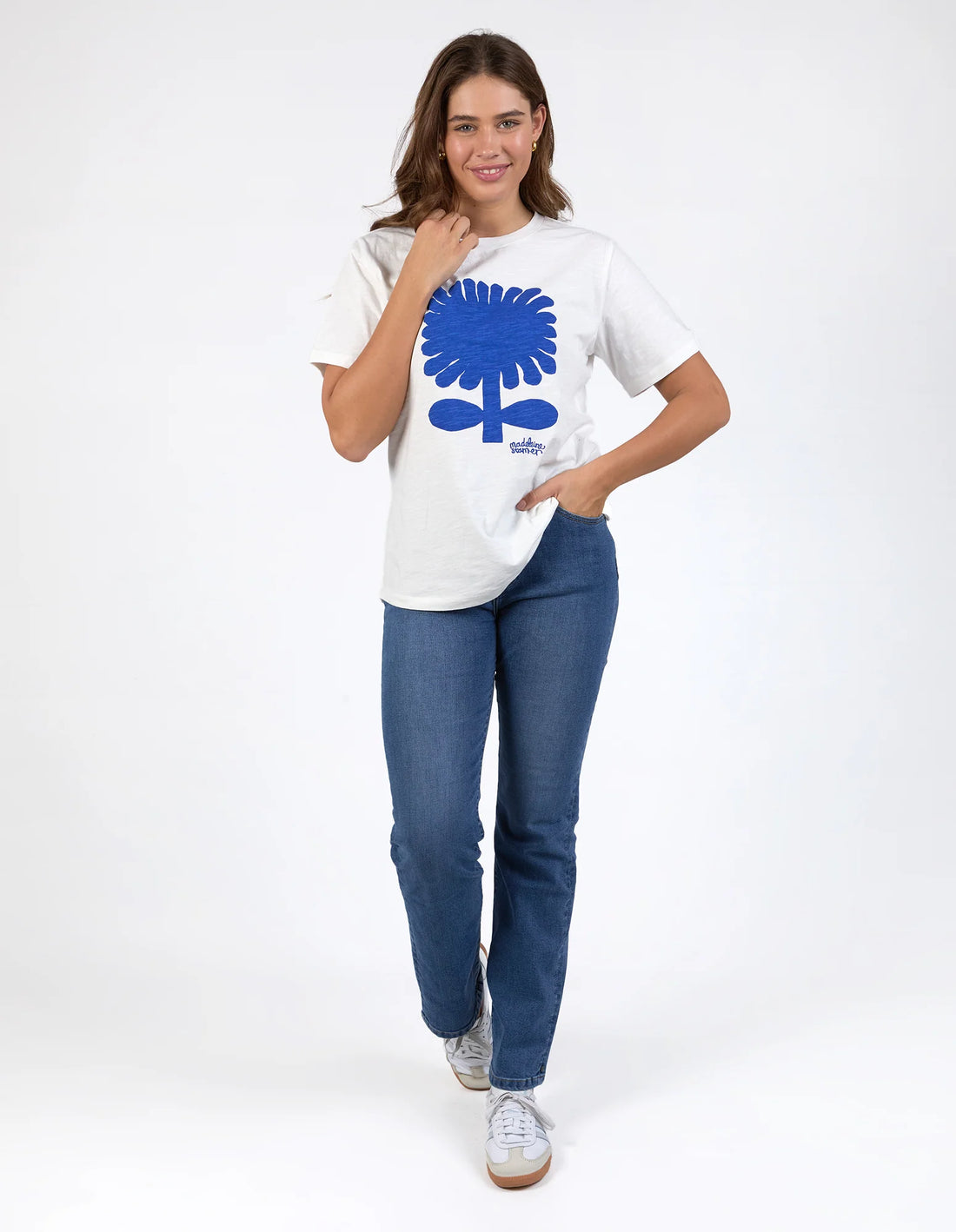Woman wearing Madeline Stamer Tee - Marshmallow and denim pants front view
