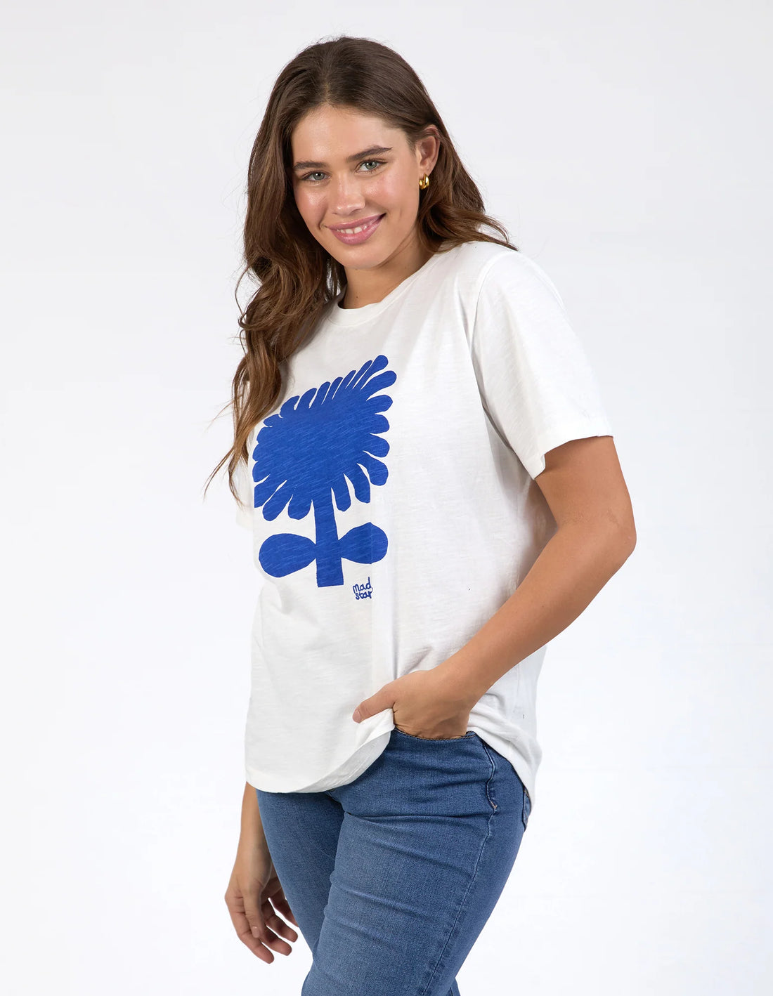 Woman wearing Madeline Stamer Tee - Marshmallow and denim pants