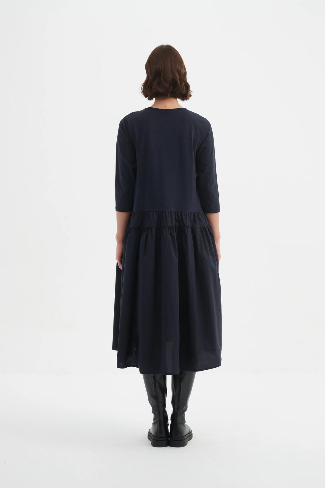 Woman wearing Drop Waist Combi Dress - Navy facing the back