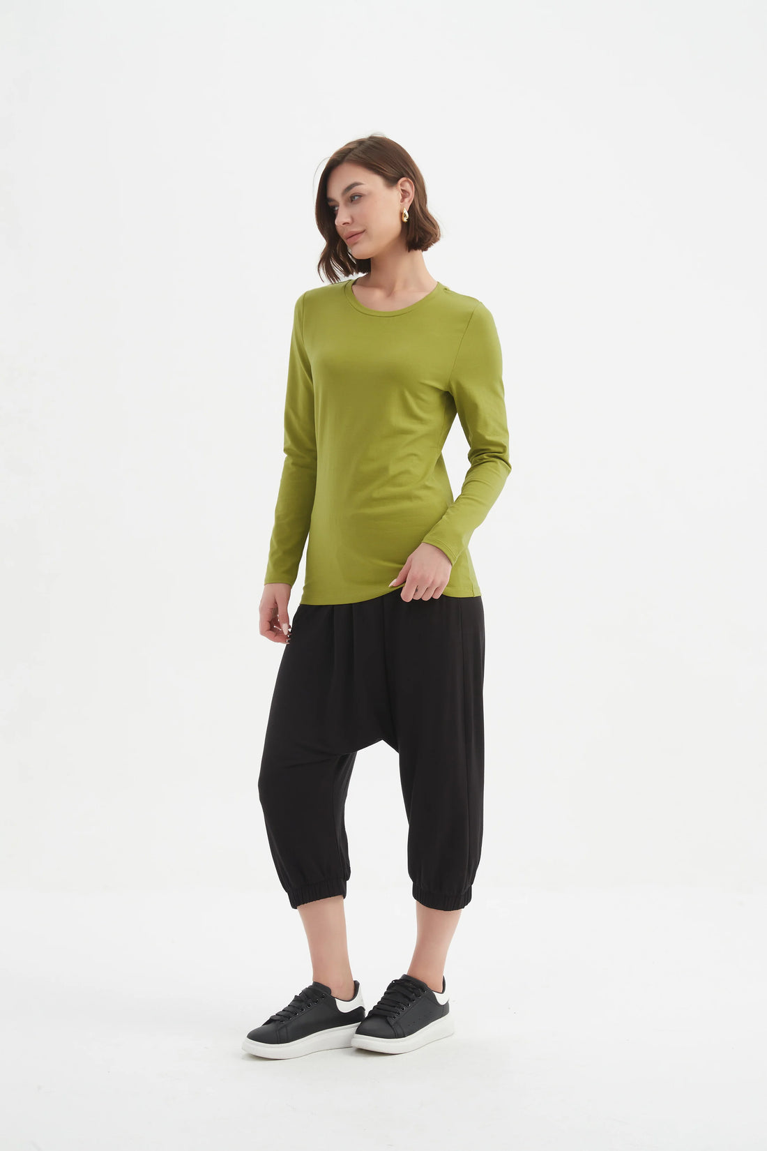 Woman wearing Long Sleeve Tshirt - Chartreuse and black pants