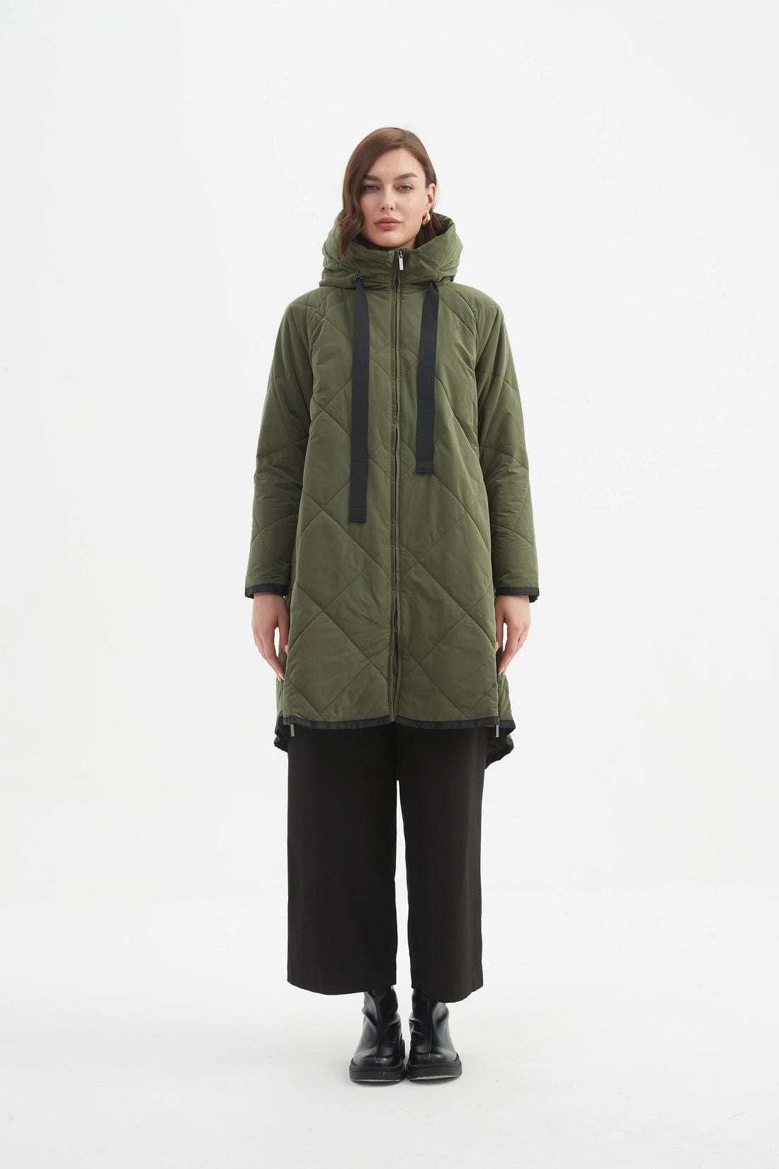 Woman wearing black pants with Zip Hem Winter Coat - Dark Olive