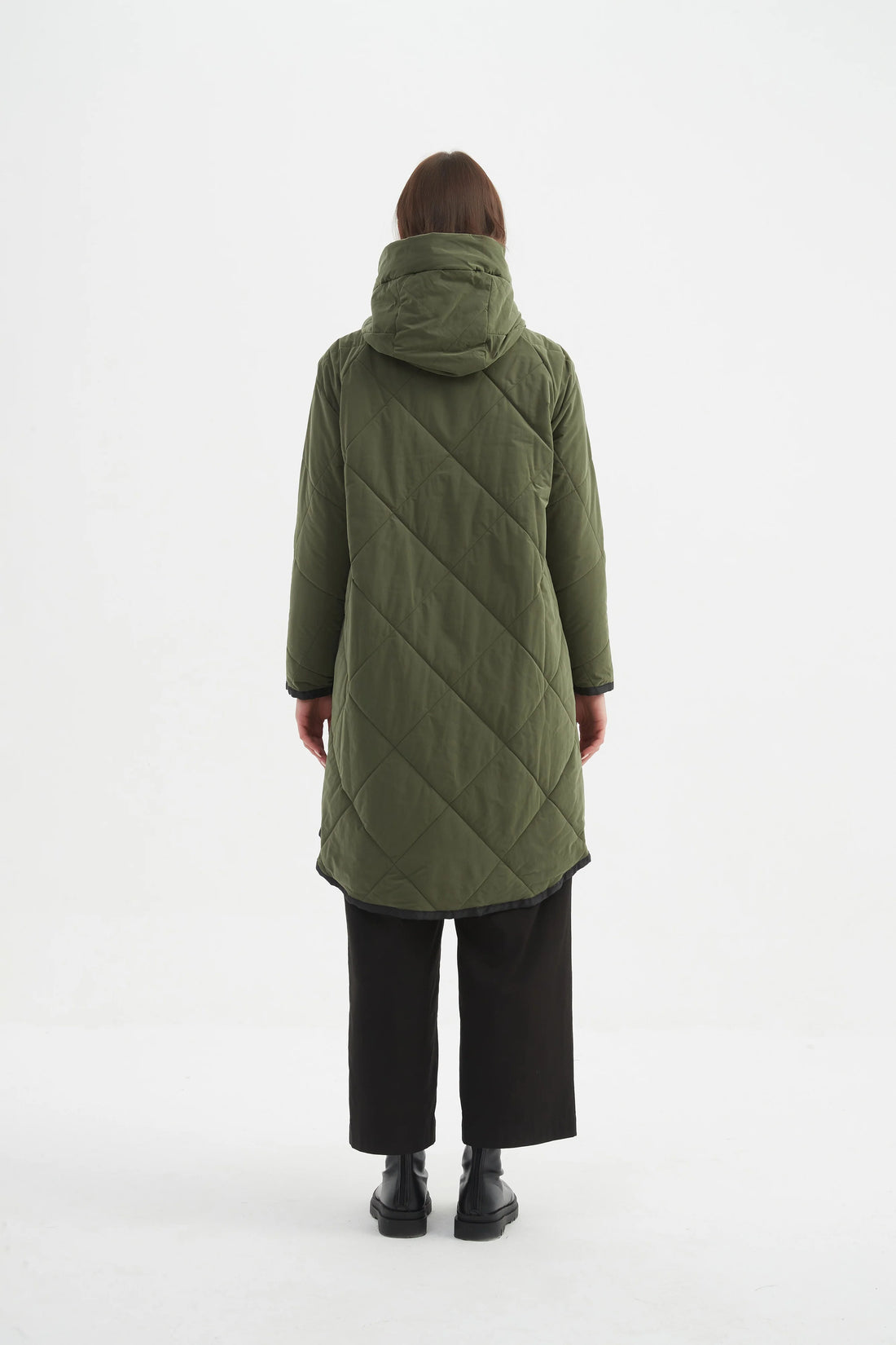 Woman wearing black pants with Zip Hem Winter Coat - Dark Olive facing the back