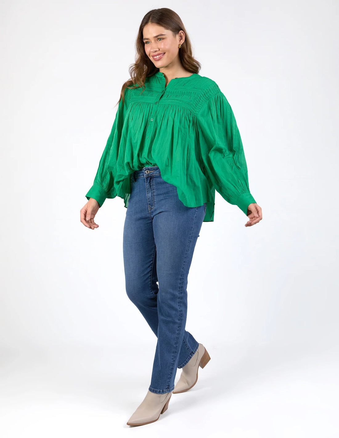 woman wearing Montana Blouse - Pine Green and denim pants side view