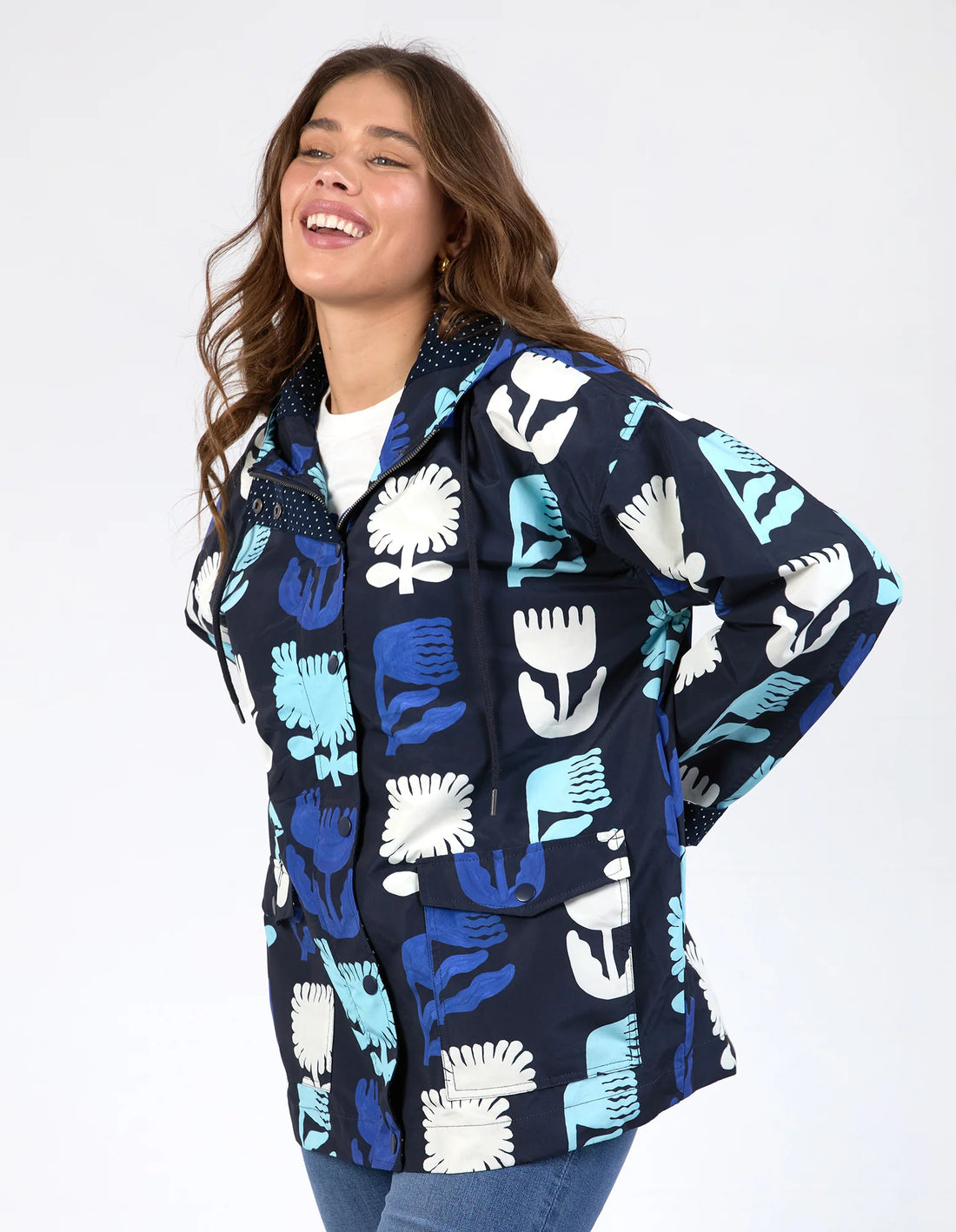 woman wearing Madeline Stamer Raincoat - Navy and denim pants