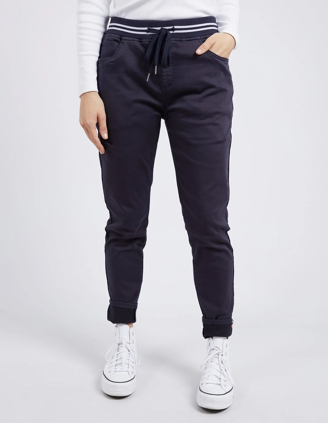 person wearing Margo Jogger - Navy with hand in the pocket