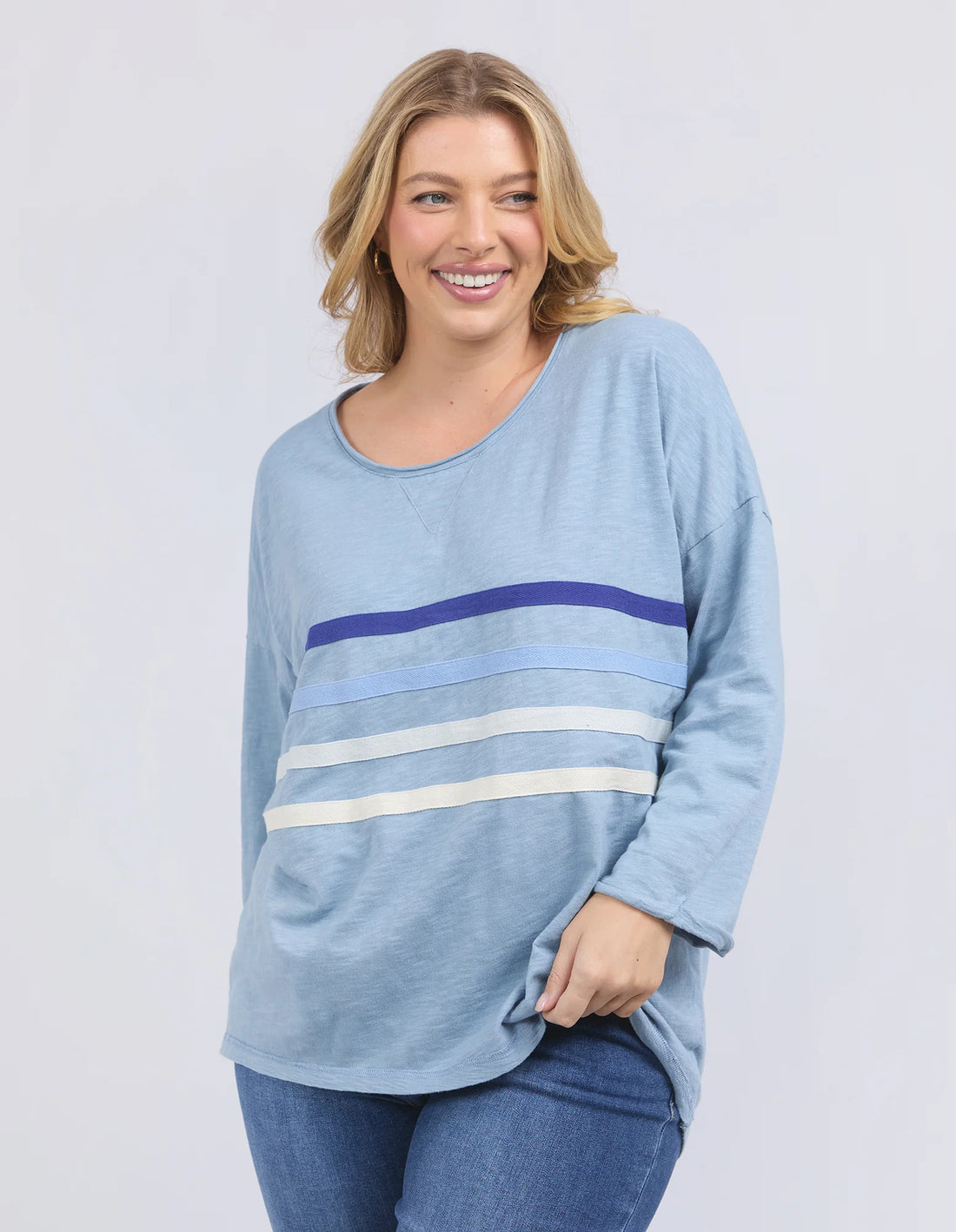 woman wearing Outlook Sweat - Steel Blue and denim pants