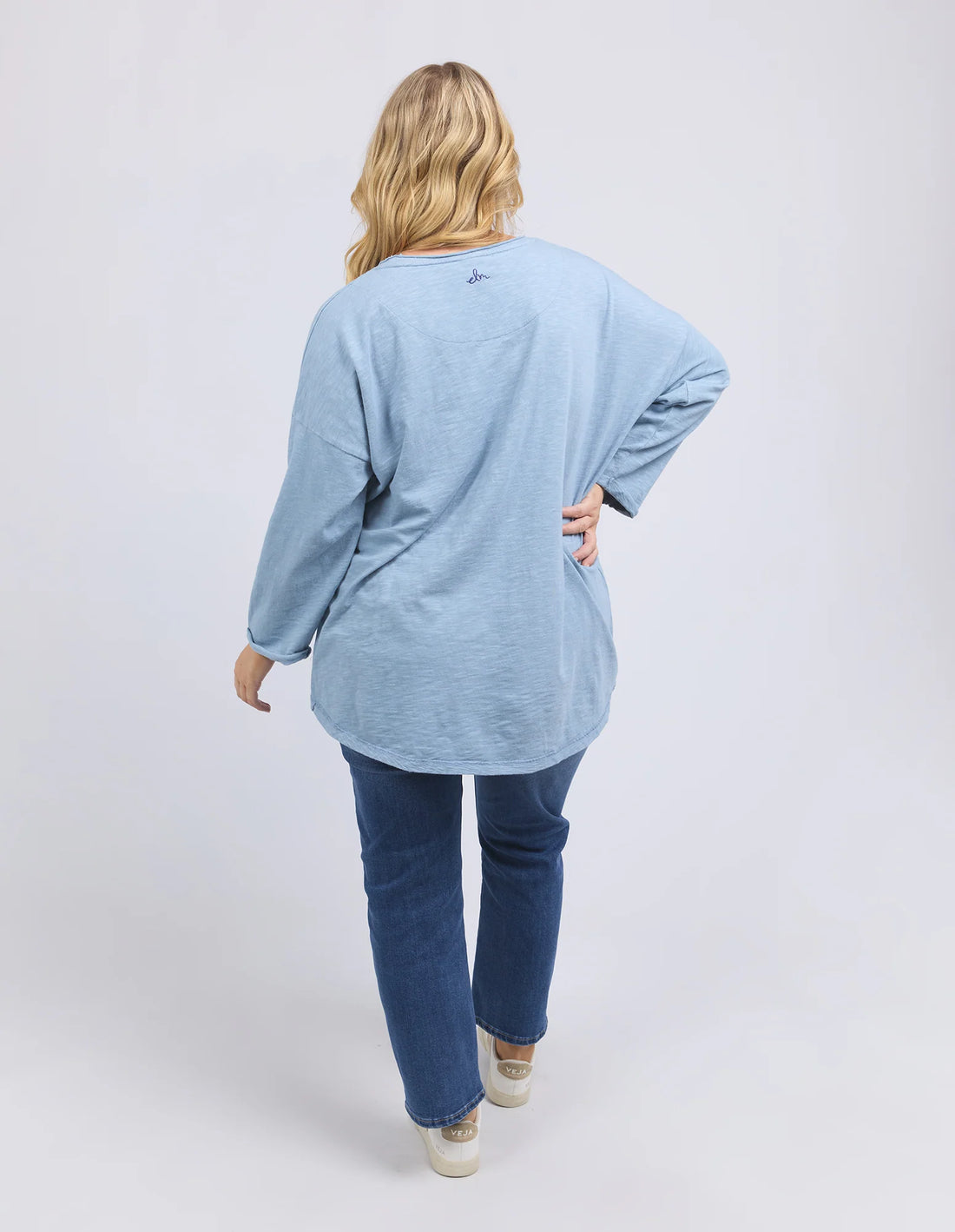 woman facing the back wearing Outlook Sweat - Steel Blue and denim pants