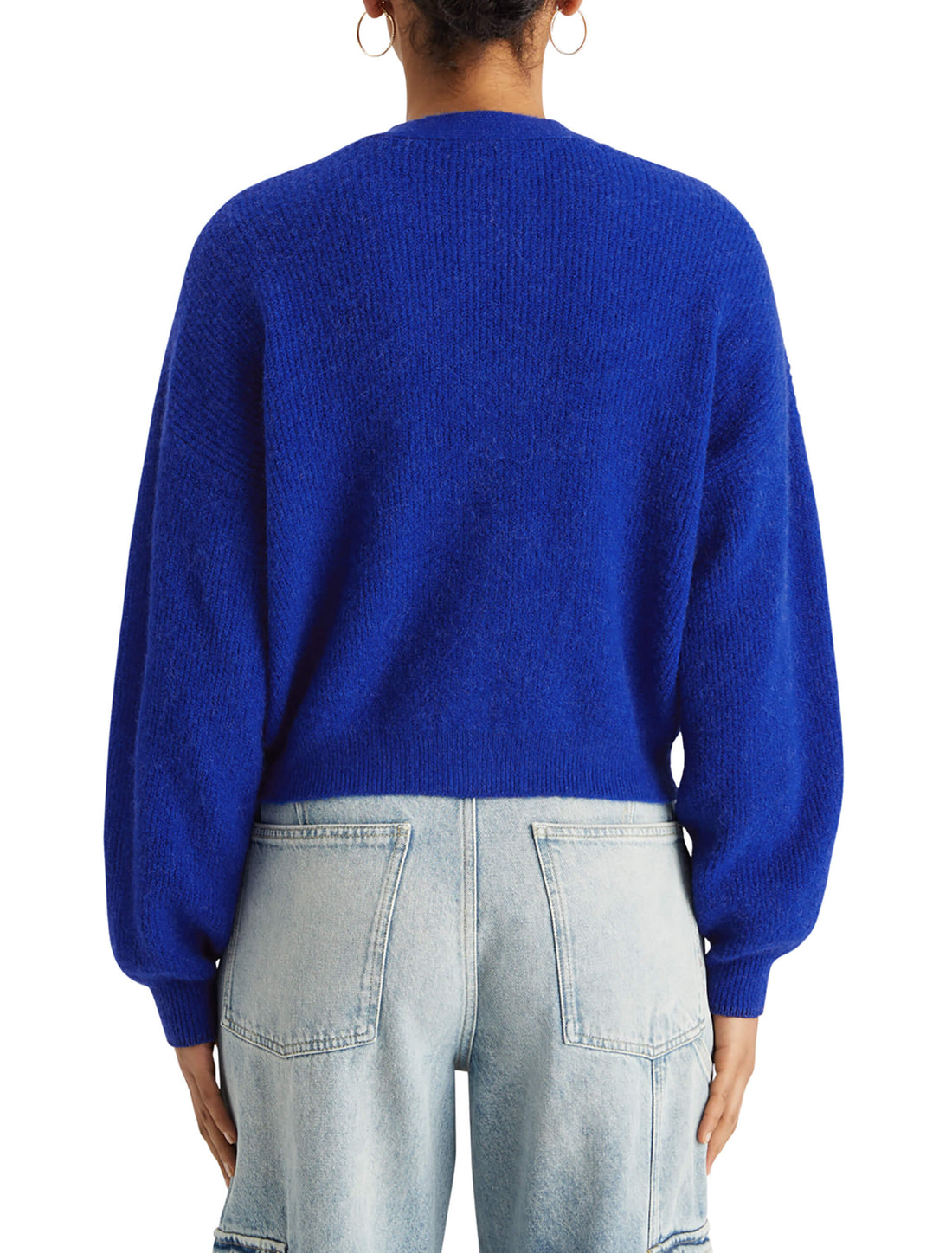 woman facing the back wearing Fuzzy Relaxed Cardigan - Electric Blue and denim pants