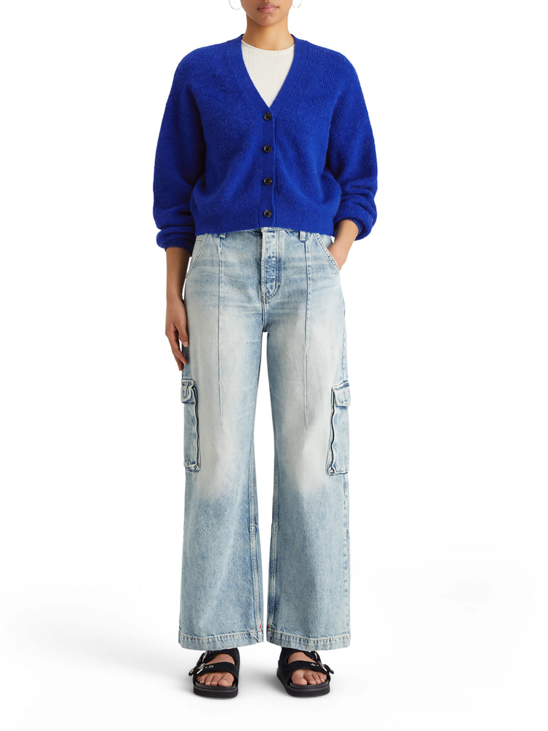 woman wearing Fuzzy Relaxed Cardigan - Electric Blue and denim pants