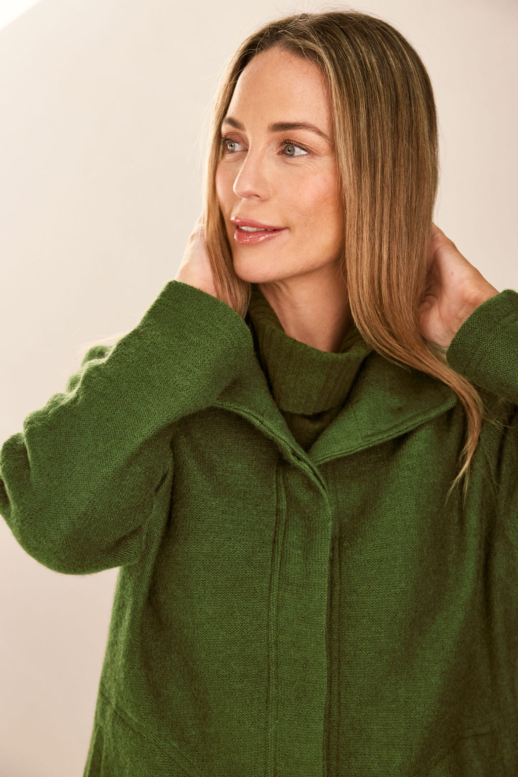 woman wearing Boiled Wool Funnel Neck Coat - Khaki