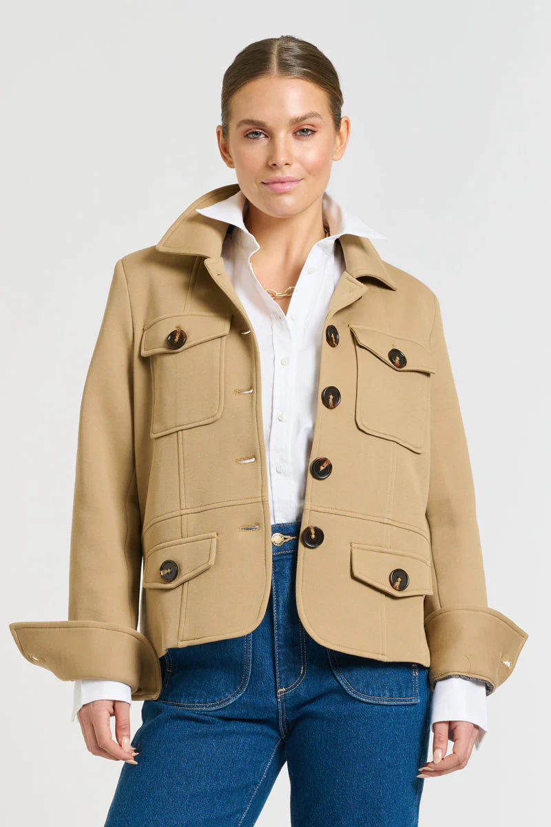 Woman wearing white long sleeve louse, blue denim pants and Hemming Scuba Jacket - Caramel