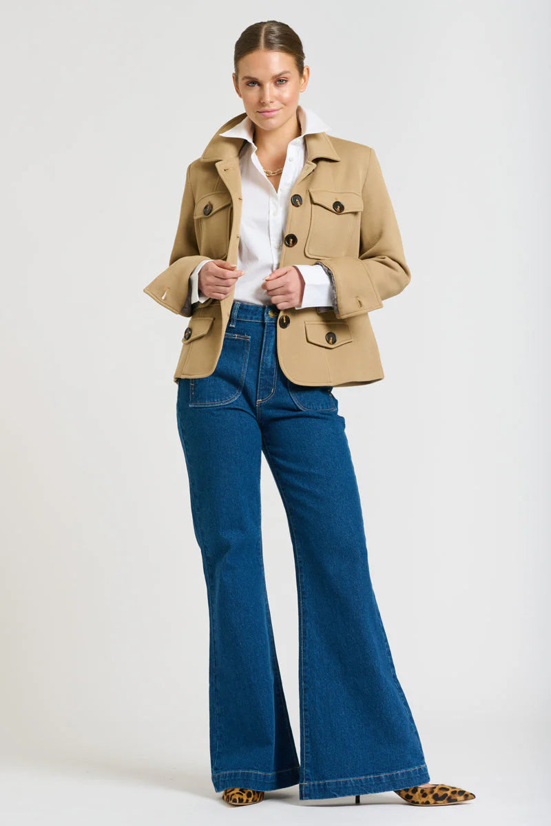 Woman wearing white long sleeve louse, blue denim pants and Hemming Scuba Jacket - Caramel